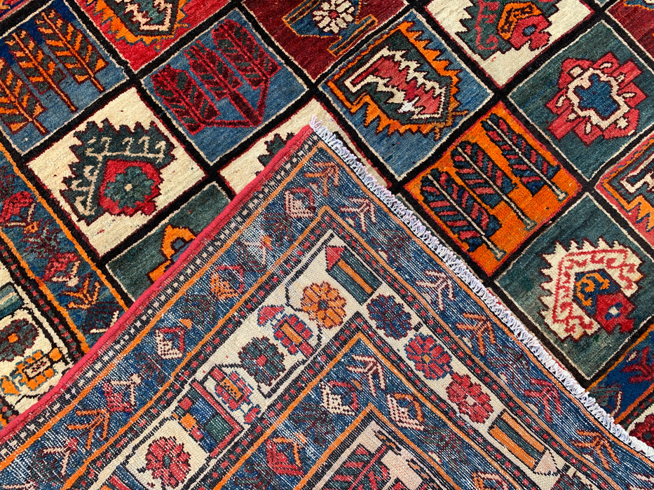 Handmade Persian Wool Area Rug Multi-colored with Strong Red and Rust/Orange accents - 7x10 - Traditional Persian Style Rug - Exact Size 9'4" x 6'6" - KBHM-1127
