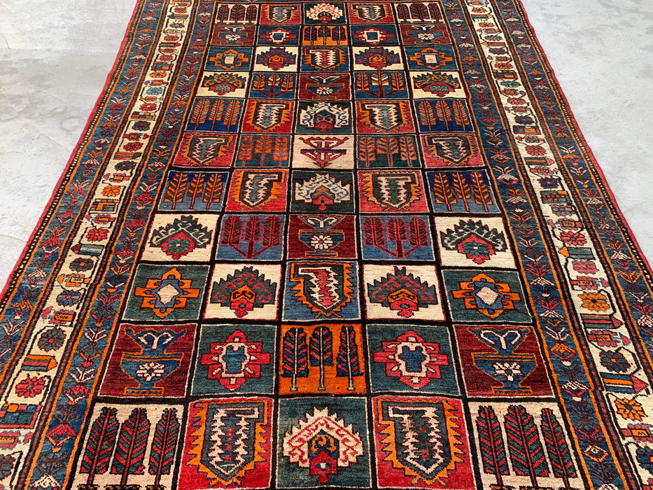 Handmade Persian Wool Area Rug Multi-colored with Strong Red and Rust/Orange accents - 7x10 - Traditional Persian Style Rug - Exact Size 9'4" x 6'6" - KBHM-1127