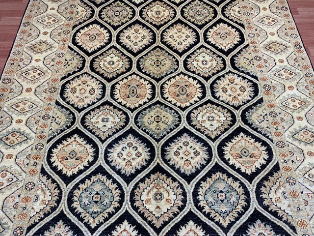 6’7 x 9’5' Hand-Knotted Wool Rug – Black Field with Ivory/Beige Border