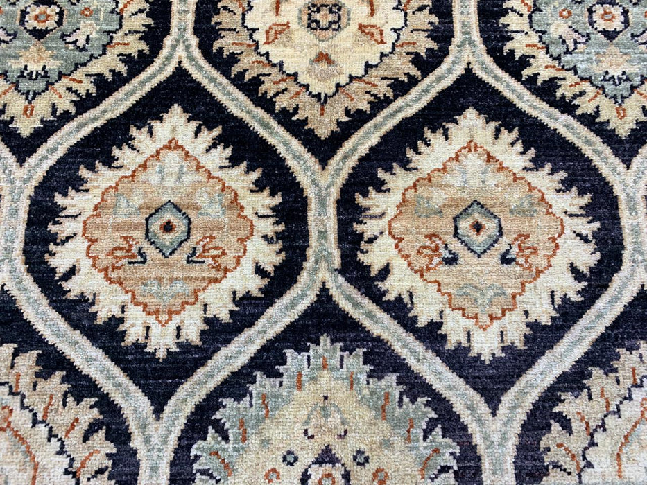 6’7 x 9’5' Hand-Knotted Wool Rug – Black Field with Ivory/Beige Border