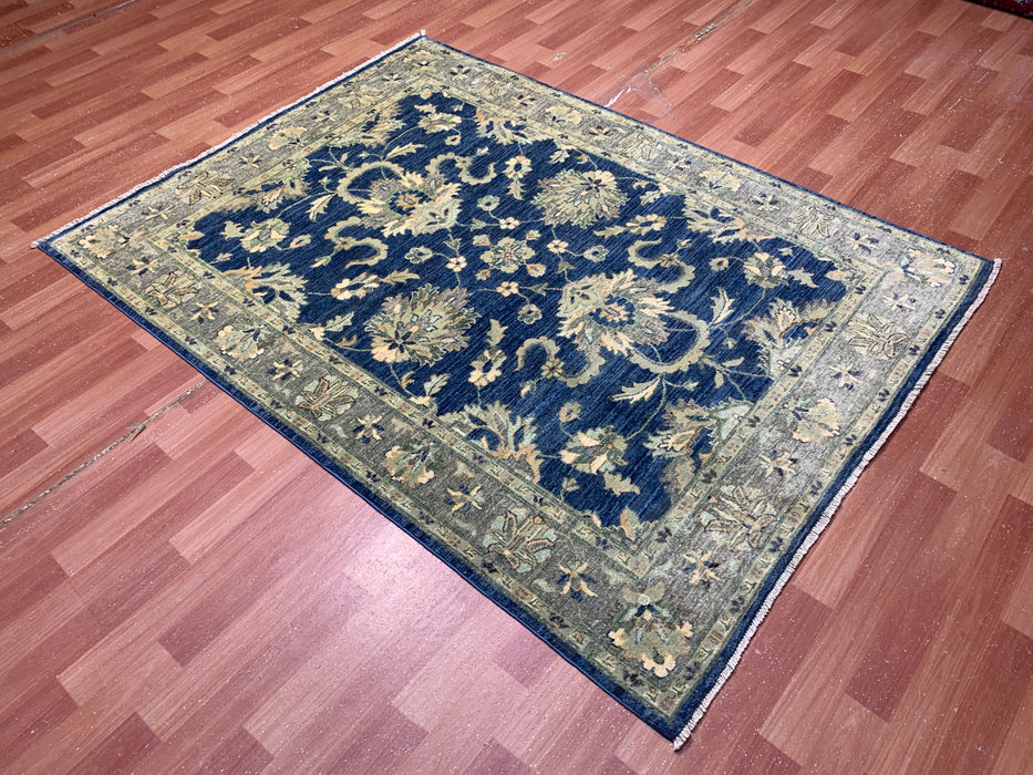 4'10" × 6'6" Hand-Knotted Wool Rug – Navy with Soft Beige & Sage Floral Border