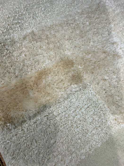 5'x8' Cream Hand Tufted Shaggy Area Rug