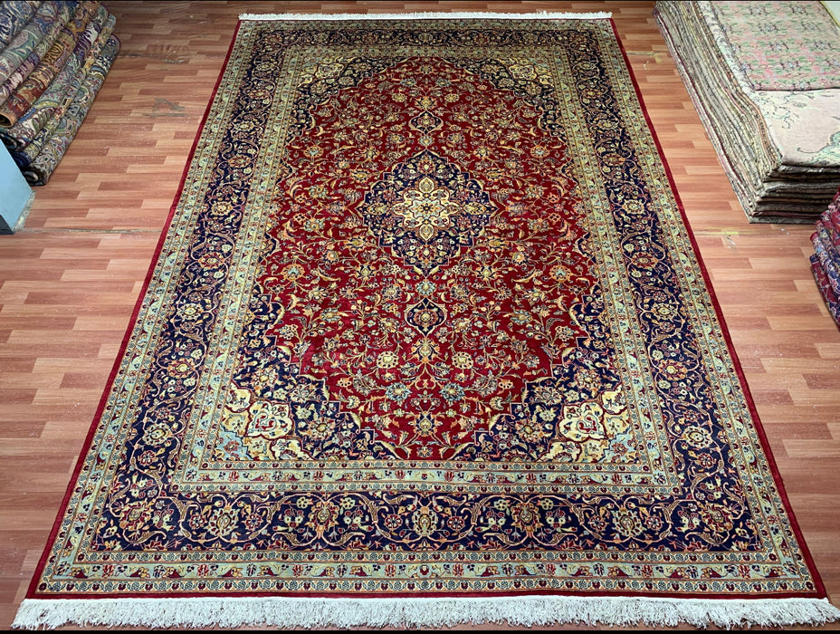 9’6” × 13’10” Hand-Knotted Persian Wool Rug – Red Field with Navy & Ivory Floral Border