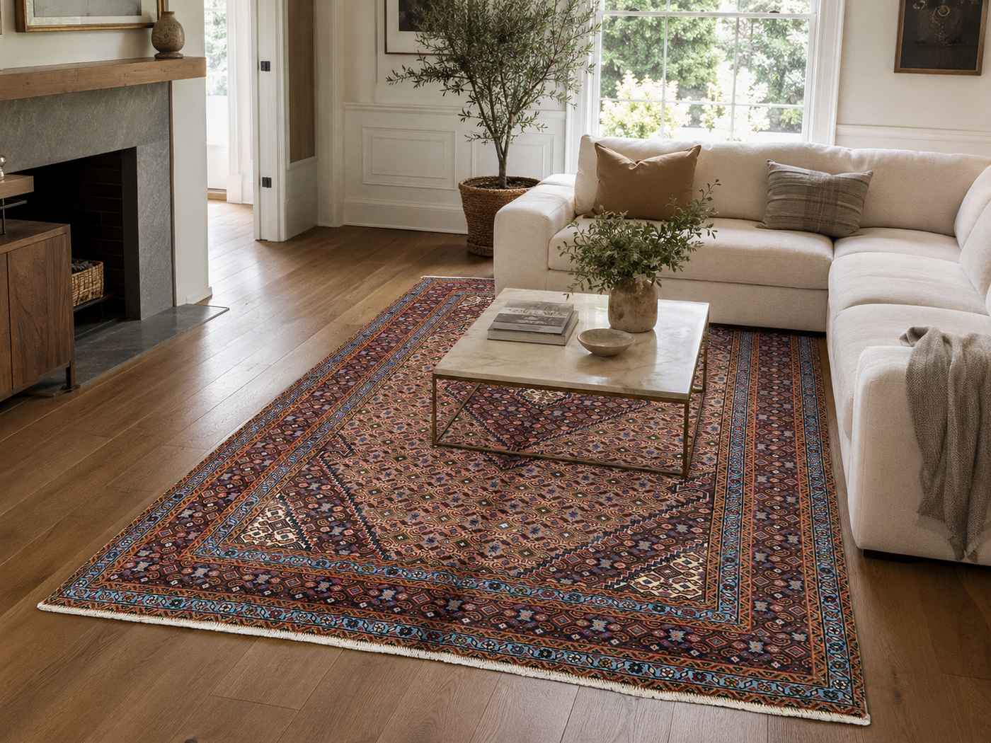 9'2" x 6'3" Handmade Persian Wool Rug styled in a room
